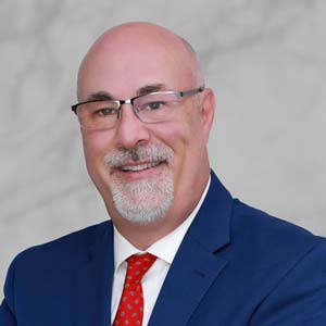 Corporate Headshot Image of Smiling Executive Man