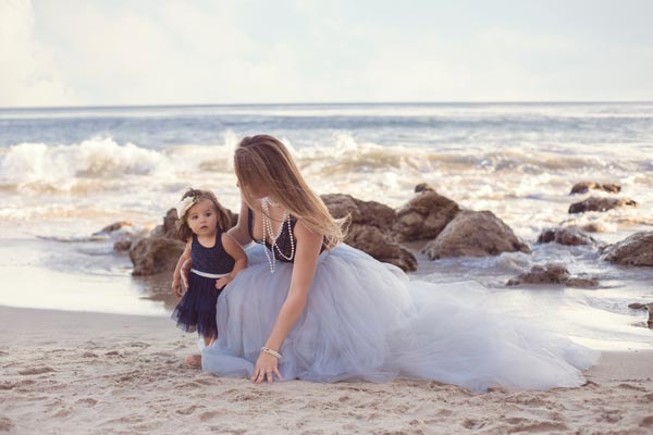 Mother and daughter on the beach